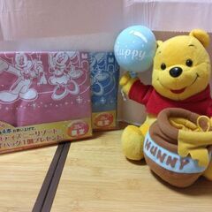 プーさんぬいぐるみとエコバックの画像
