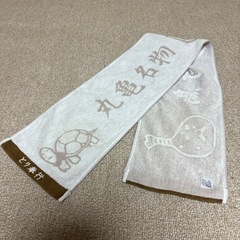 とり奉行骨付じゅうじゅう　マフラータオルの画像