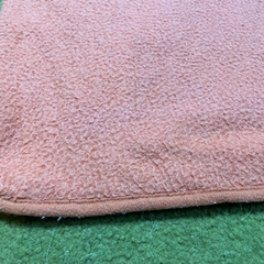 フリース生地のマット(オレンジ・使用感あり)の画像