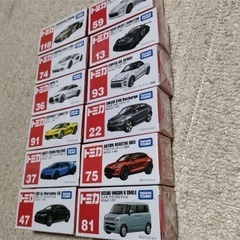 新品未使用未開封トミカ12台セットの画像