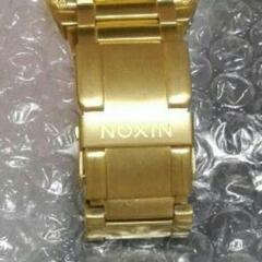 NIXONゴールド時計の画像