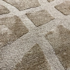 ニトリ デザイン ラグ ベージュ系の画像