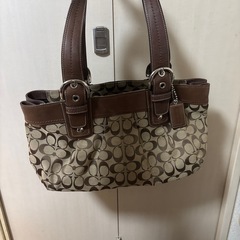 Coach トートバッグ ベージュ・ブラウン　チャーム付の画像
