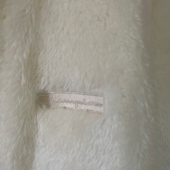 Champion 白のふわふわアウターの画像