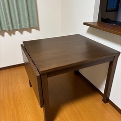 折りたたみ伸長式ダイニングテーブルの画像