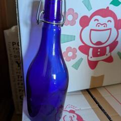 機械栓付きガラス瓶20-30個の画像