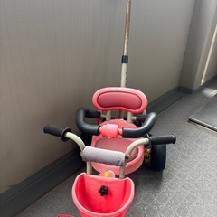 手押し棒付き三輪車の画像