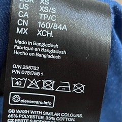 H&M スリムフィット イージーアイロンシャツ XSの画像