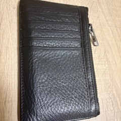 status anxietyのコインケースの画像