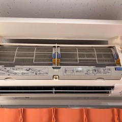 「取り外せる方」ダイキン　お掃除機能付きAN25UCS—W　主に8畳　の画像