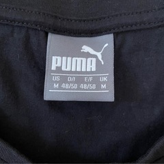 プーマノースリーブの黒Tシャツの画像