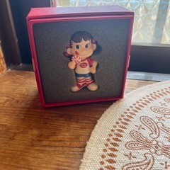 急ぎ。ペコちゃん100年記念とペコ缶の画像