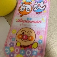 アンパンマンのぬいぐるみとおまけのピックとミニタオルの画像