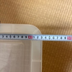 透明の衣類ケースの画像