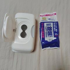 アルコールタオル半分と収納箱ケースの画像