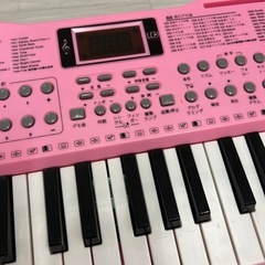 電子ピアノ　ピンク　マイク付きの画像