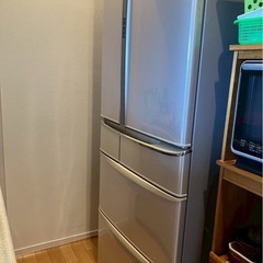 冷蔵庫　洗濯機　テレビ　机　電子レンジ　食器棚の画像