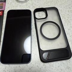 SIMロック解除済みiPhone 14本体訳アリとワイヤレス充電器の画像