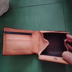 折り財布。の画像