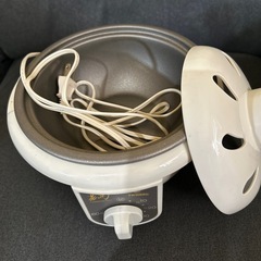 新品未使用の電気お粥鍋の画像
