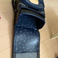 中古
ランドセル　黒(ブルーのライン)の画像