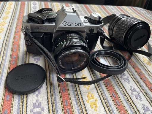 CANON AE-1 PROGRAM　50ｍｍ　グリップ、シグマzoomレンズ付 CANON AE-1 PROGRAM 50mm グリップ、シグマzoomレンズ付