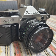 CANON AE-1 PROGRAM　50ｍｍ　グリップ、シグマzoomレンズ付の画像