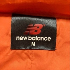 new balance ダウンジャケット(レディース用)の画像