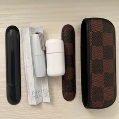 iQOSカバーと掃除用品の画像