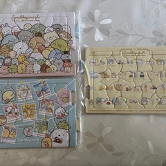3輪スクーターとおもちゃとパズルの画像