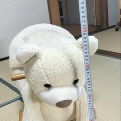くまのぬいぐるみ木馬の画像