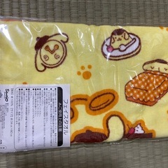 ポムポムプリンのフェイスタオルの画像