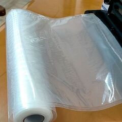 真空パック器  と 専用ロールの画像