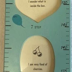 子どもの身長計(写真フォルダ付き)の画像