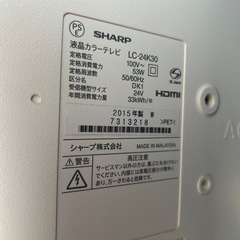 テレビ、録画機、棚、リモコンの画像