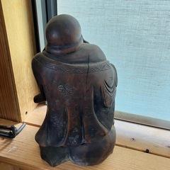 木彫りの縁起物セット　・布袋様の置物（福を呼ぶ笑顔の神様） ・七福神が龍の船に乗った「宝船」の画像