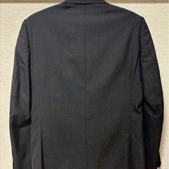 男性用スーツ上下セット（サイズ表記あり）の画像