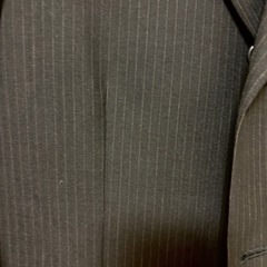 男性用スーツ上下セット（サイズ表記あり）の画像
