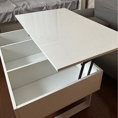 昇降式テーブル　収納付きの画像