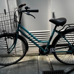 自転車　ママチャリ　水色
の画像