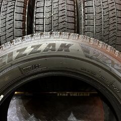 BS BRIDGESTONE BLIZZAK VRX2 175/65R14 14インチ スタッドレス 4本 21年製 バリ溝 コルト ベリーサ ヴィッツ パッソ フィット等　(KTH345)の画像