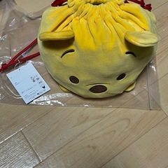 ディズニー　プーさんの巾着袋（新品）と洗濯ネット
の画像