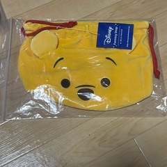 ディズニー　プーさんの巾着袋（新品）と洗濯ネット
の画像