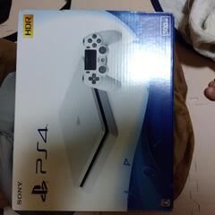 PS4本体（箱付属品付き）とMHIソフトの画像