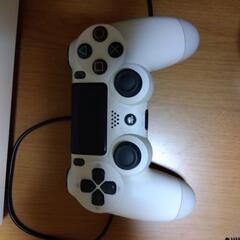 PS4本体（箱付属品付き）とMHIソフトの画像
