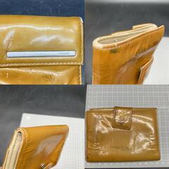 PRADA プラダ 財布 レザー ゴールド系 二つ折り財布　メンズレディース　中古キズ汚れ・型崩れの画像