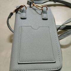 水色の財布＆携帯が入るところも付いています。の画像