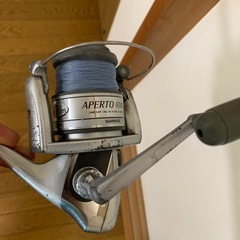 船竿とスピニングリールの画像