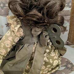 可愛い顔立ちのオルゴール付きお人形の画像