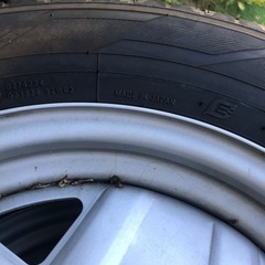 ジムニーのノーマルタイヤ　ホイール付きの画像